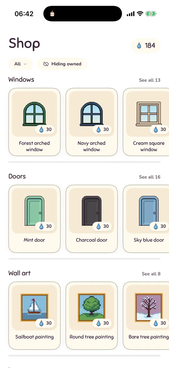 The shop with shelves for windows, doors and wall art, each card priced in dewdrops